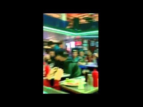 Waitress at Ellen's Stardust Diner singing "I Knew You Were Trouble" by Taylor Swift