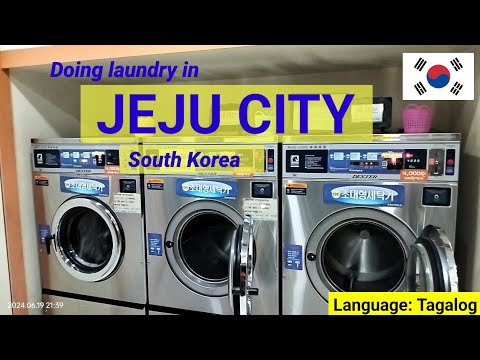 Using the self service coin operated washing machine in Jeju City, South Korea