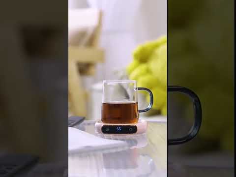 "Never Drink Cold Coffee Again!  Introducing the Smart Coffee Mug Warmer with Constant Temp heating.