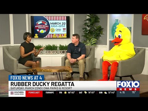 RMHC Executive Director Paul Giardina and friend talk about Rubber Ducky Regatta fundraiser