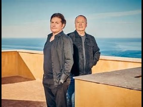 Simple Minds : Jim Kerr & Charlie Burchill talking about their early days , Jim's stammer , new LP.