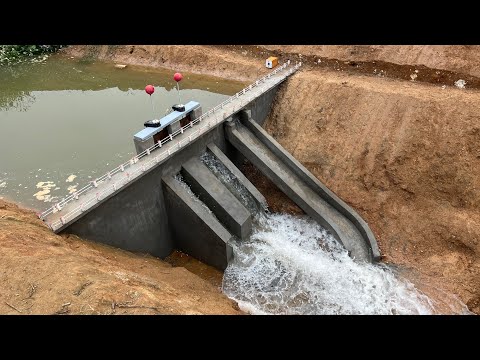 Construction of a powerful 2-gate discharge dam