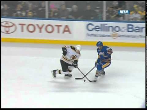 Andrew Ference is tripped by Thomas Vanek leading to a goal