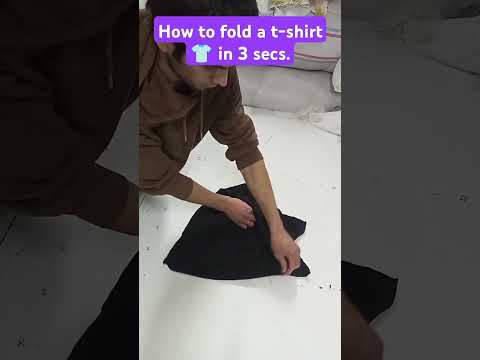 How To Fold A T-shirt 👕 in 3 Seconds #shorts #howto #howtofoldtshirt