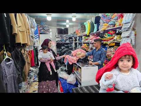 Buying warm clothes by a mother for her child in winter ❄️/ nomadic documentary