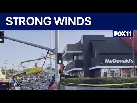 Winds knock down store, restaurant signs across LA County