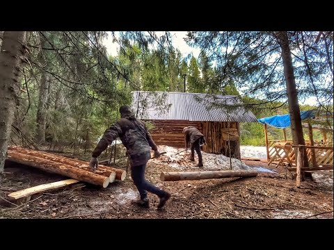 My brother and I harvested logs for the bath and sawed boards to refine the spring