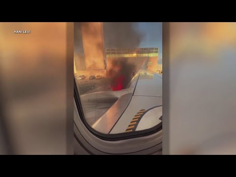 American Airlines passengers evacuated after engine fire at Denver airport