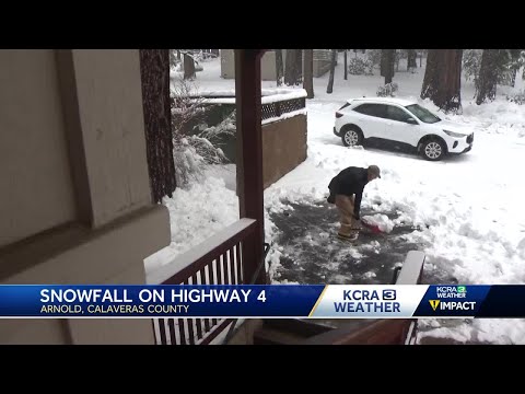 Snowfall lands on the small town of Arnold in Calaveras County