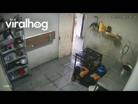 Woman Slips and Falls While Mopping Kitchen || ViralHog