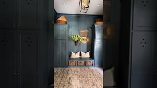 The paint color and floor in this beautiful mudroom have us swooning!