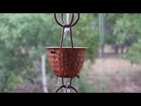 Rain back adobe porch Sunday afternoon June 23 2024