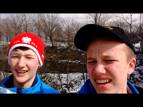 The fellas go tobogganing on a golf course