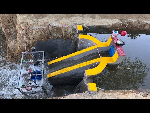 Mini hydroelectric design with unique screw turbine