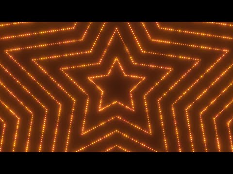 Bright Gold Flashing Sparkle Lights Arranged In Expanding Star Shapes 4K Motion Background for Edits