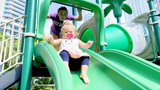 Maggie Plays on the playground with baby brother!