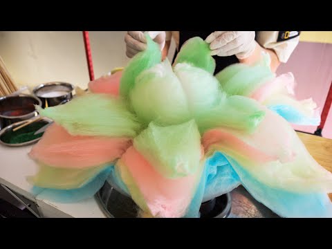 The process of making sweet flowers. Korean cotton candy master