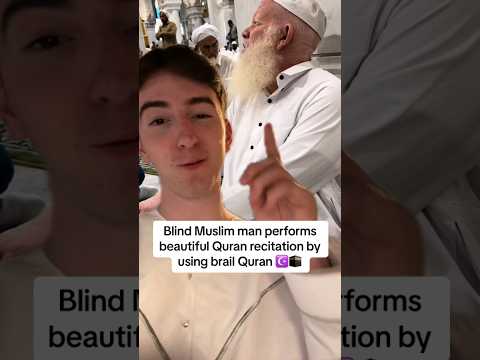 Blind Muslim man performs Quran recitation by using brail Quran