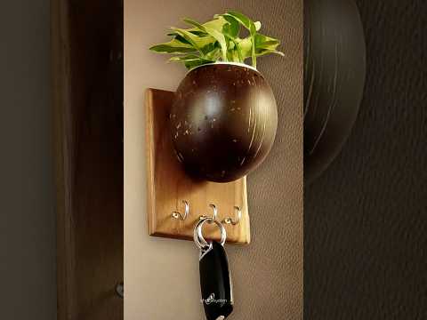 Wall mount pot with key holders using coconut shell.#coconutshellcrafts #homedecor #greenliving